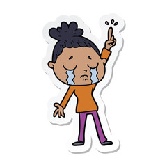 sticker of a cartoon crying woman raising hand
