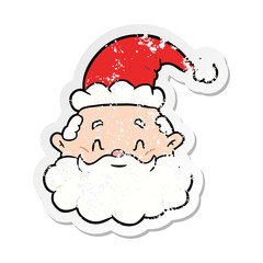 distressed sticker of a cartoon santa claus