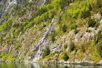 Fototapeta na wymiar Norway Waterfalls into fjord