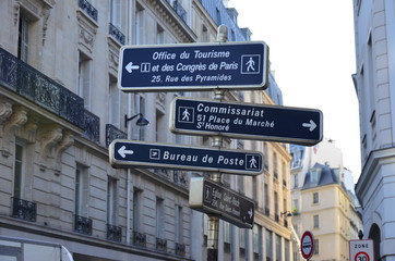 Road signs on the street in Paris.