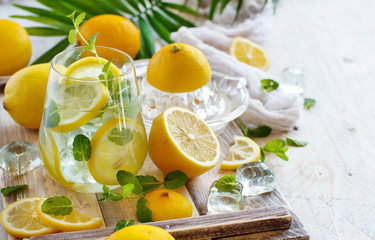Homemade refreshing drink with lemon juice and mint