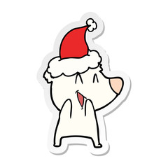 laughing polar bear sticker cartoon of a wearing santa hat