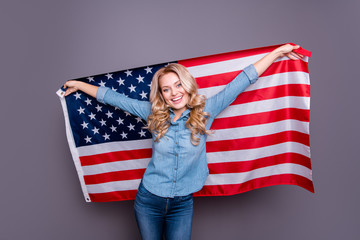 Portrait of her she nice charming lovely attractive cheerful optimistic slim wavy-haired lady holding in hands flag green card lottery win winner isolated over gray purple violet pastel background