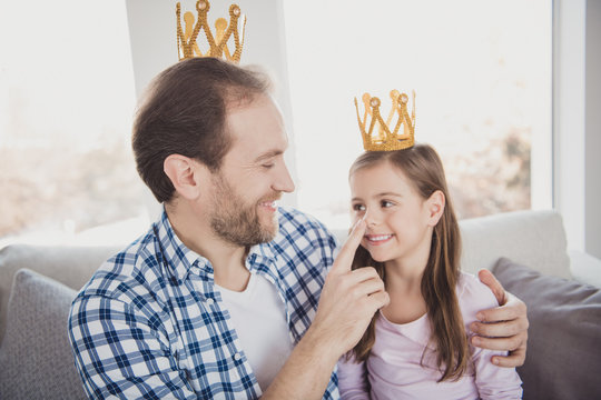 Close-up portrait of his he her she nice cute lovely sweet tender attractive cheerful pre-teen girl bearded dad daddy sitting on divan touching nose in light white interior room indoors