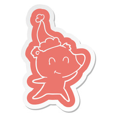 female bear cartoon  sticker of a wearing santa hat