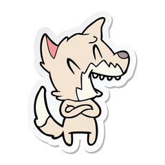 sticker of a laughing fox cartoon