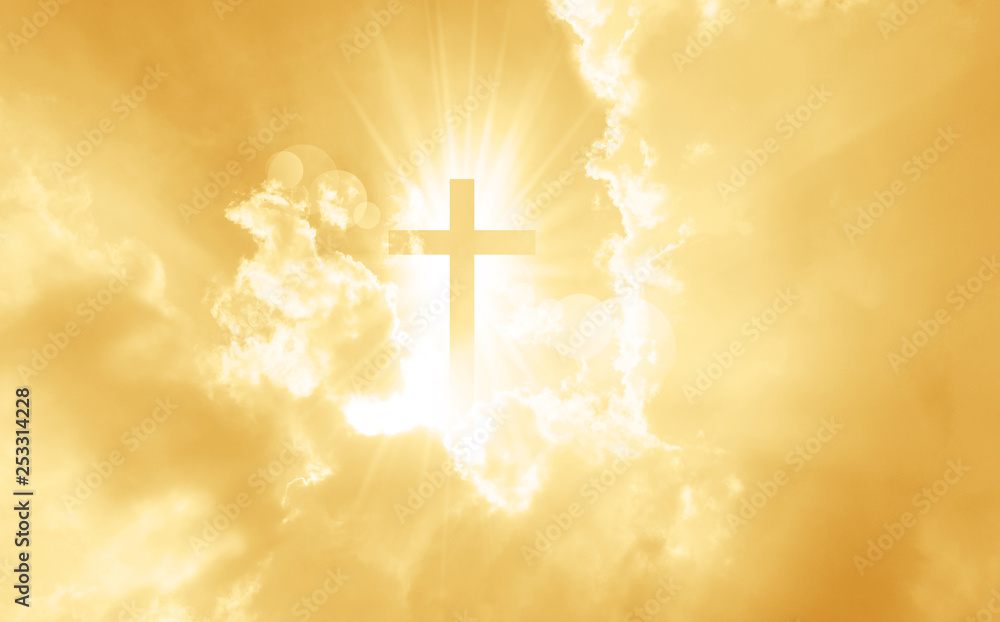 Wall mural christian cross appears bright in the yellow sky - Wall murals
