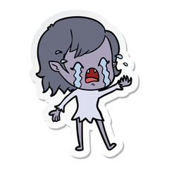 sticker of a cartoon crying vampire girl