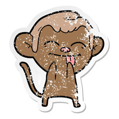 distressed sticker of a funny cartoon monkey