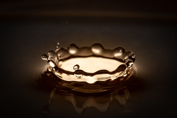 Water splash created by drop impact on water surface. Amazing macro capture. Looks like a crown made from water, beautiful what's possible to create with just water.