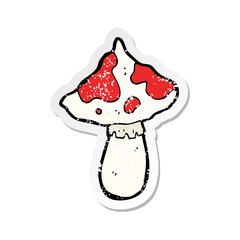 retro distressed sticker of a cartoon toadstool