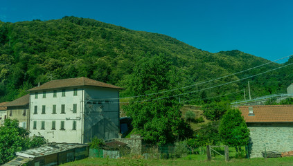 Fototapeta na wymiar Italy,La Spezia to Kasltelruth train, a house with bushes in front of a building