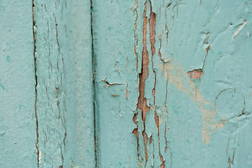 detail from old weathered green turquoise wood texture close-up