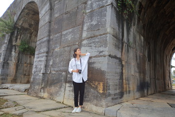 woman traveling to Ho citadel in Thanh Hoa,Vietnam