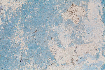 closeup of chipped paint on blue wall , texture ready