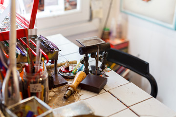 Glass craftsman workplace  in a Murano workshop, Venice