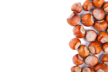 Raw hazelnuts isolated on a white background