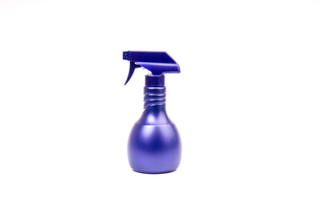 Purple blank plastic spray detergent bottle isolated on white background. Selective focus