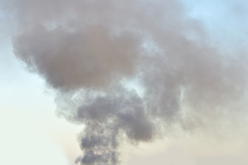 black smoke over cloudy sky
