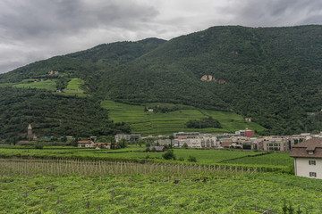 Obraz premium Italy,La Spezia to Kasltelruth train, a castle on top of a lush green field