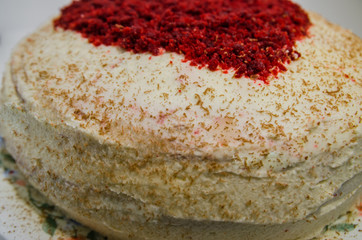Red velvet cake with a heart on top of it 