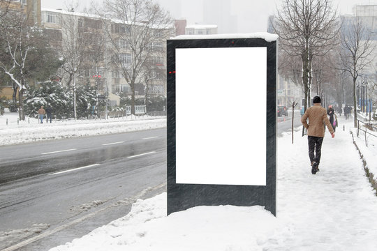 Billboard On Street In Winter