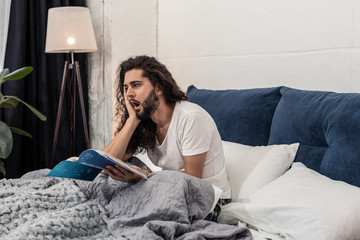 Nice good looking man thinking about sleeping