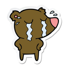 sticker of a cartoon crying polar bear