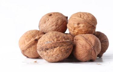 Walnuts isolated on white background.