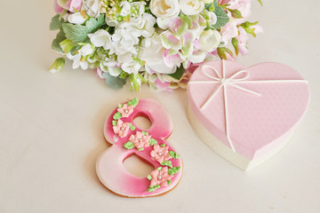 Gingerbreads for March 8 in the bright kitchen with flowers