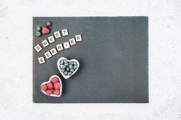 Valentine Day composition berries in heart plates