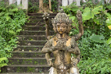 Statue of multiarm god in Bali, Indonesia.