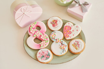 Gingerbreads for March 8 in the bright kitchen with flowers