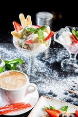 Various desserts: waffles, cream, coffee, ice cream. Sweet snacks. Dessert menu