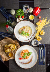 Table setting in the restaurant. Banquet, menu, serving. Concept - view from above