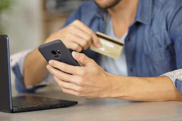 happy man buying online