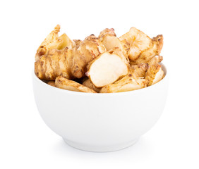Jerusalem artichoke in bowl on white background