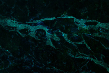 Dark green marble texture background with high resolution, top view of natural tiles stone in luxury and seamless glitter pattern.