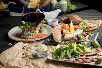Sandwiches with salted salmon and cottage cheese. Bruschetta with various toppings