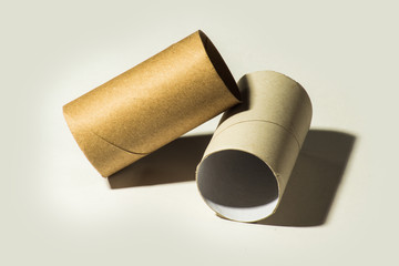 Single empty toilet paper roll isolated on a white background