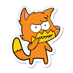 sticker of a cartoon grinning fox