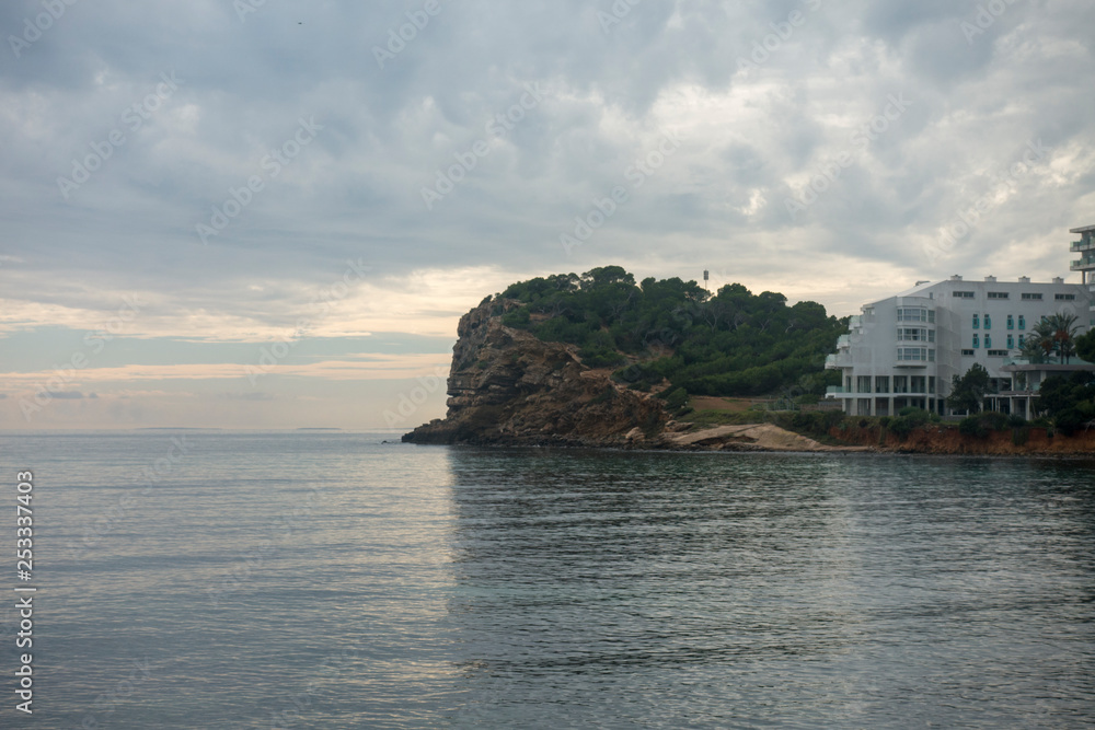 Wall mural the coast of ibiza a very cloudy day