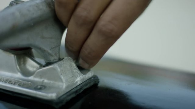 Building a skateboard. Using crip tape. Slow Motion. Filmed on Red Dragon