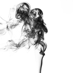 abstract Smoking.Explosive powder black Smoke on white background.