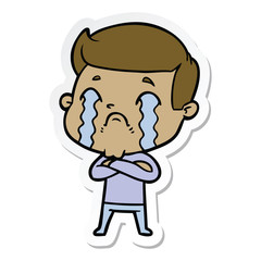 sticker of a cartoon man crying