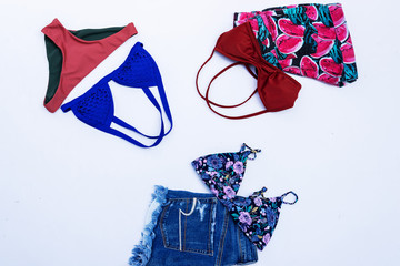 summer bikini swimsuit clothes and accessories concept.