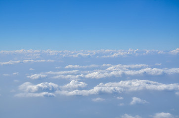 the sky with clouds view from airplane window