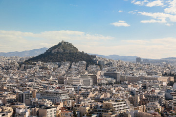 View from Acropolis Hill to Lycabettus Hill, Greek Parliament on the background of the Athens city, Greece.