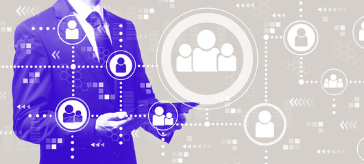 Obraz premium Social connections with businessman holding a tablet computer