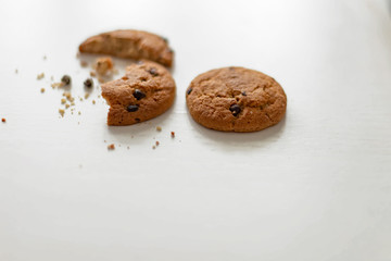 oatmeal cookies with chocolate chips on white table
